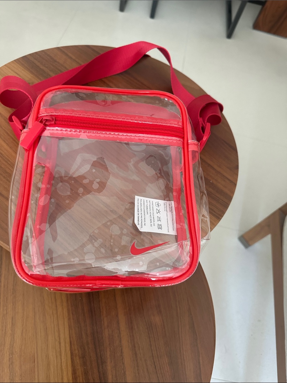 Nike Red Transparent Crossbody Shoulder Bag comes with a shoe box and bag